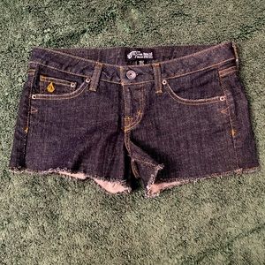 Volcom dark blue denim shorts in size 5 or 27 womens